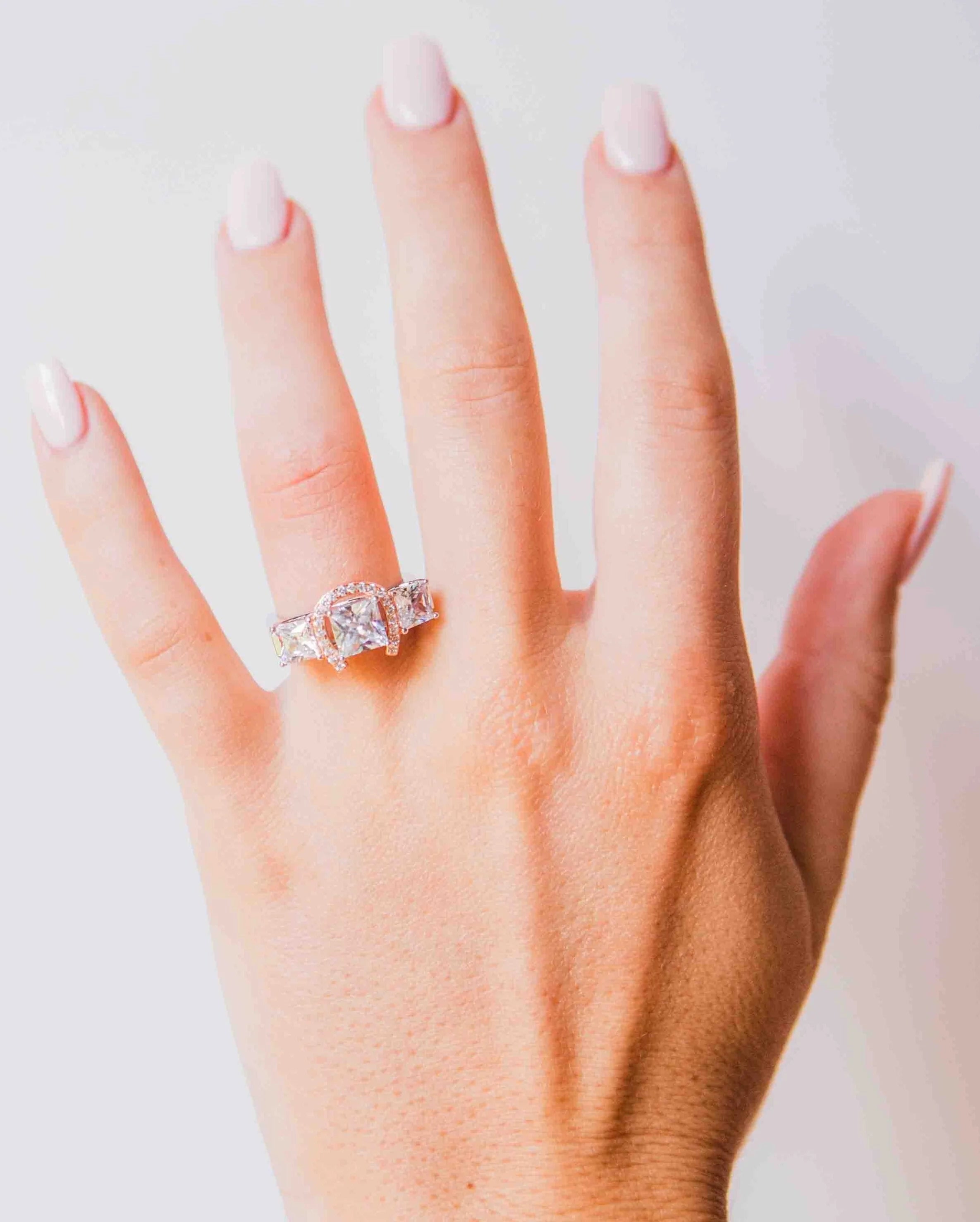 HR004P Kelly Herd Large Princess Cut Three Stone Horseshoe Ring with Rose Gold Plated Horseshoe- Sterling Silver